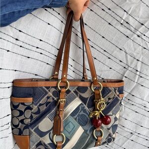 vintage Coach denim patchwork tote bag featuring leather trim